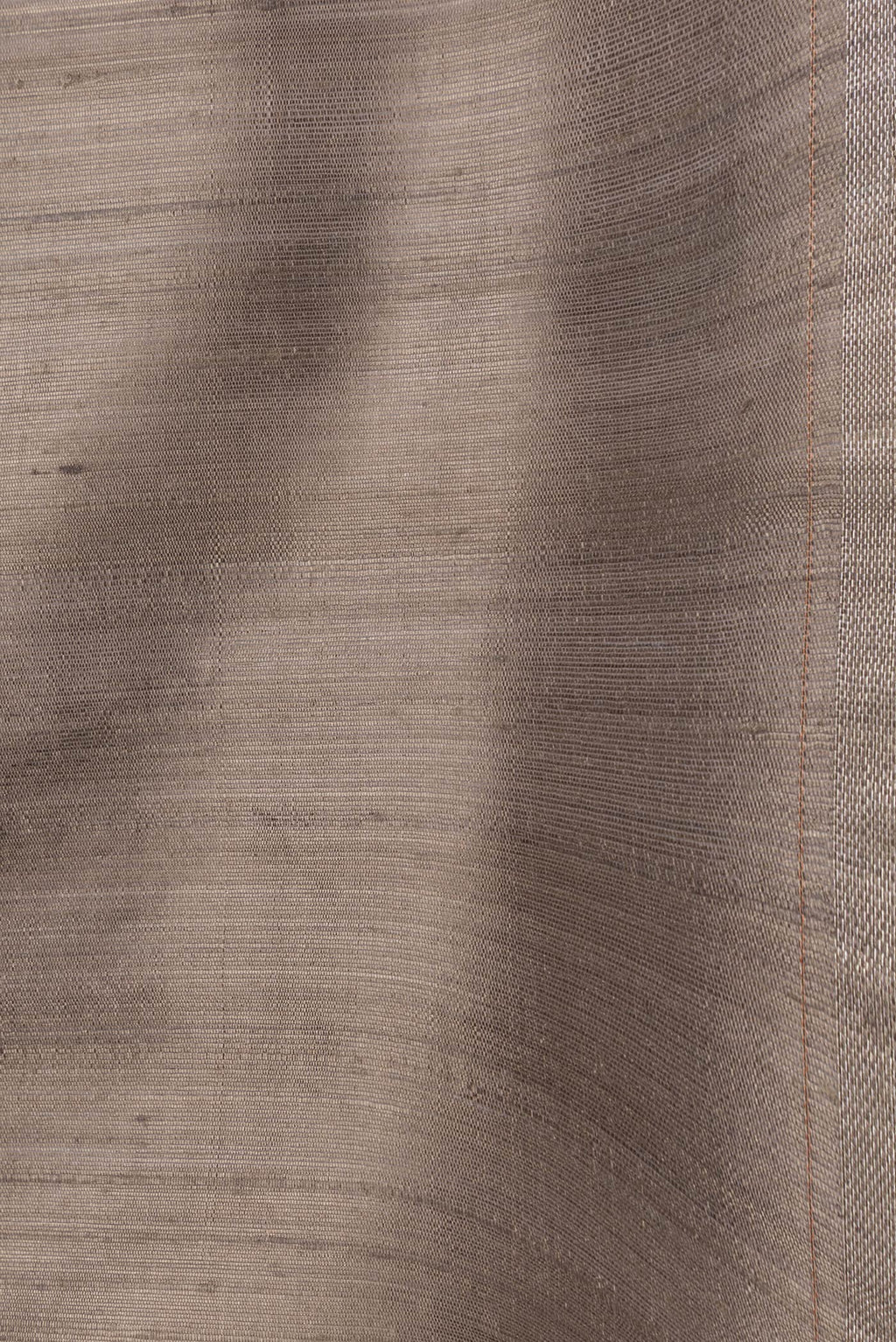 Border image of Grey Dual Tone Raw Silk Saree with Plain Body and Thin Zari Line. 