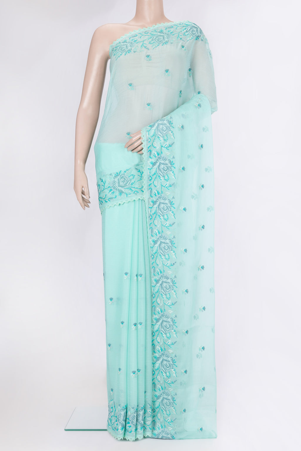 Sea Green Blended Chiffon Saree with Embroidery on the body and Embroidery Border.  displayed on a mannequin