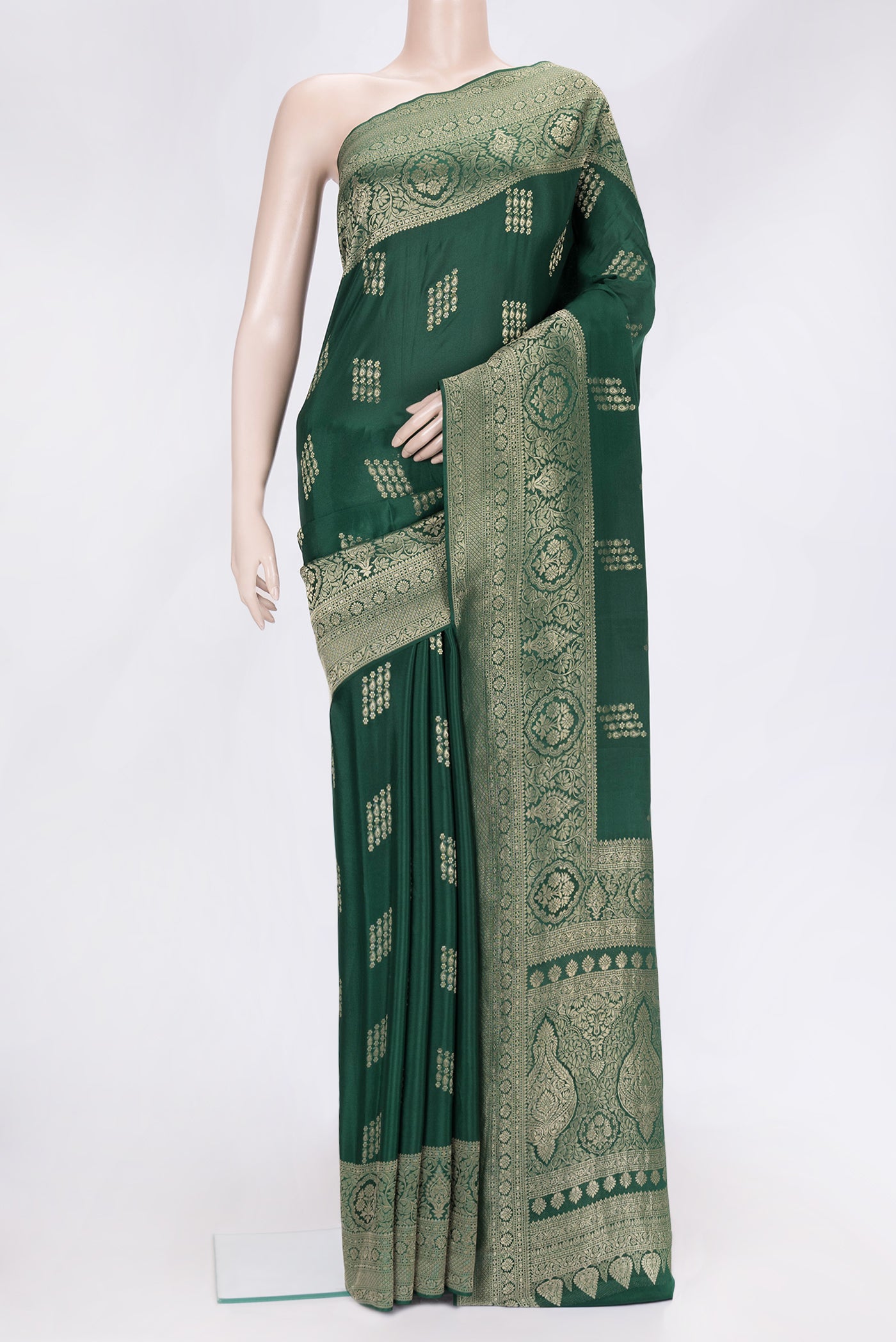 Bottle Green Dual Tone Mysore Georgette Saree with Zari Butta on the body and Zari Border.  displayed on a mannequin