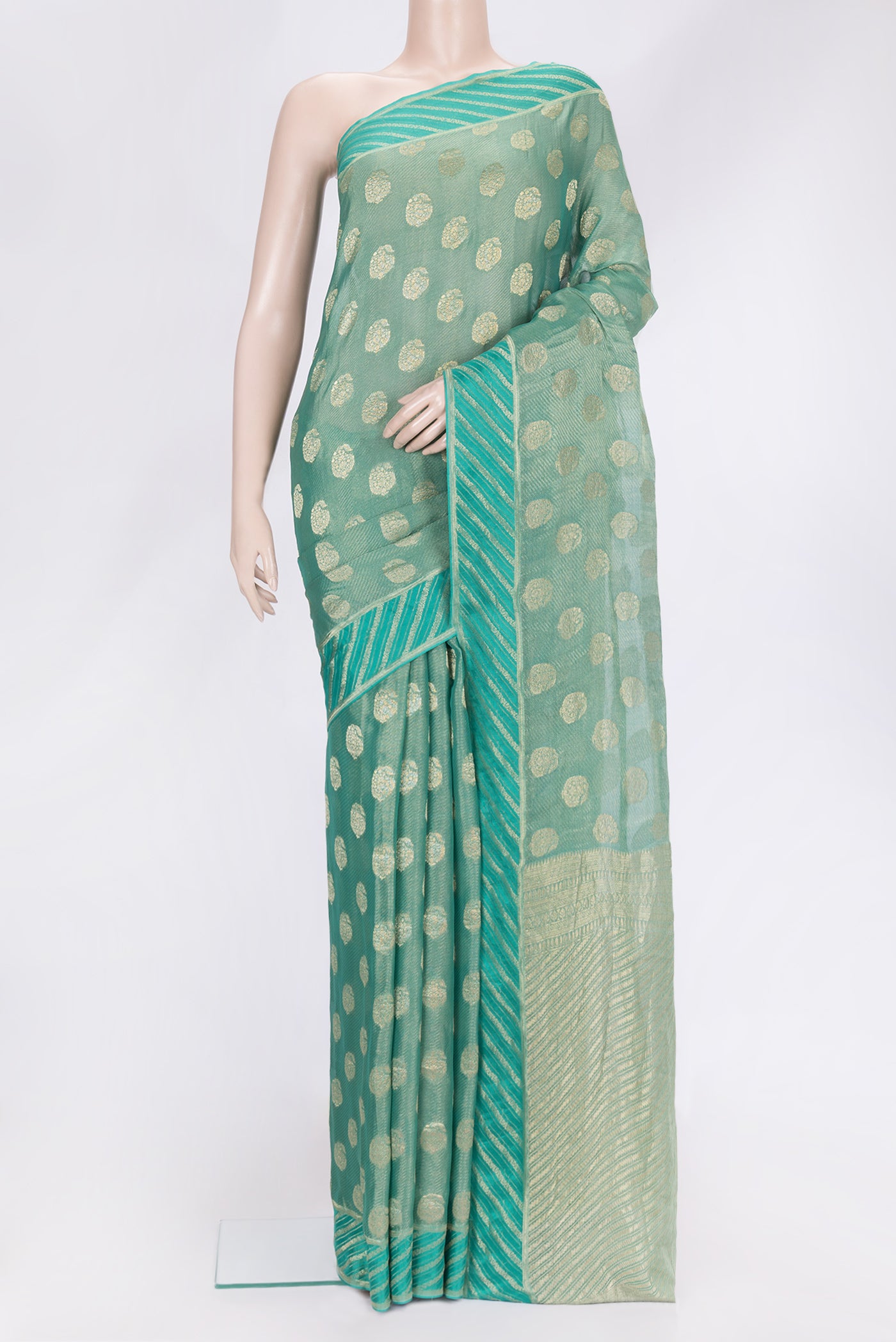 Sea Green Dual Tone Mysore Georgette Saree with Zari Brocade on the body and Fancy Border.  displayed on a mannequin