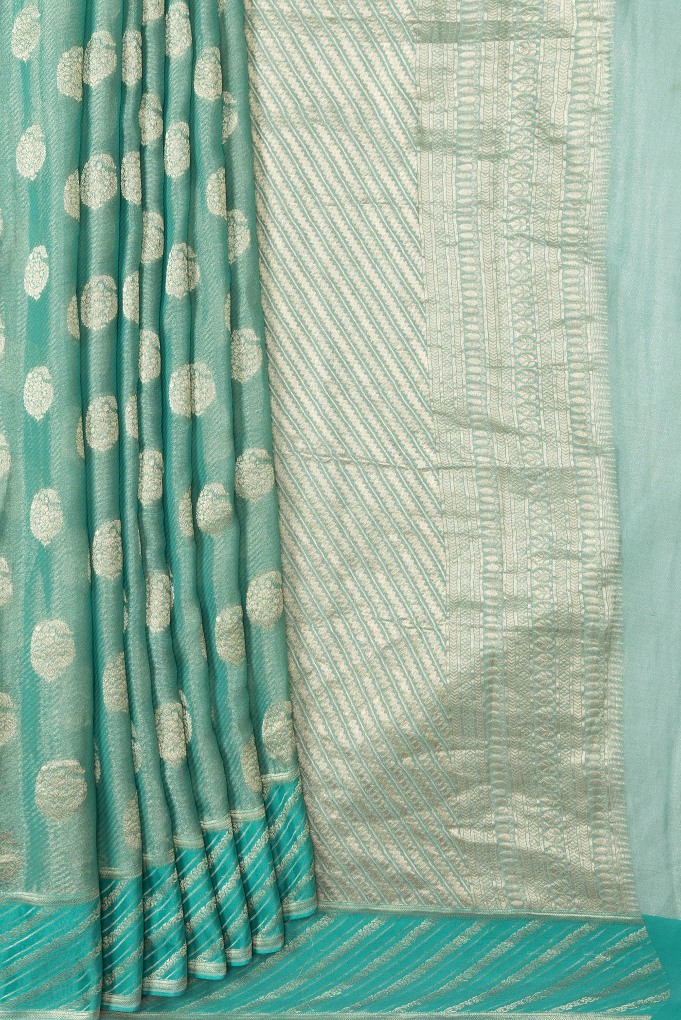 Pleats and pallu of Sea Green Dual Tone Mysore Georgette Saree with Zari Brocade on the body and Fancy Border. 
