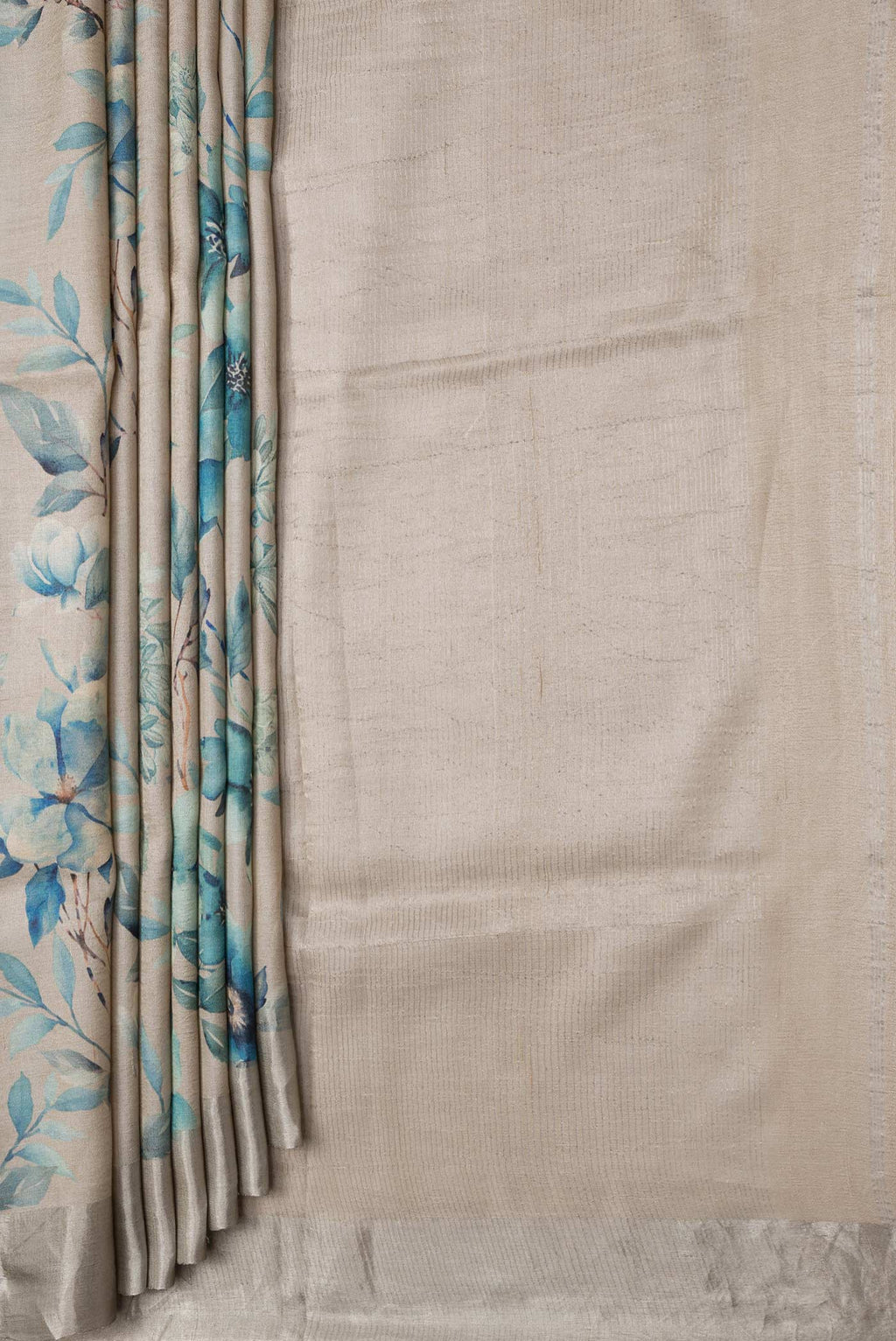 Pleats and pallu of Beige Dual Tone Tussar Silk Saree with Printed design on the body and Zari Border. 
