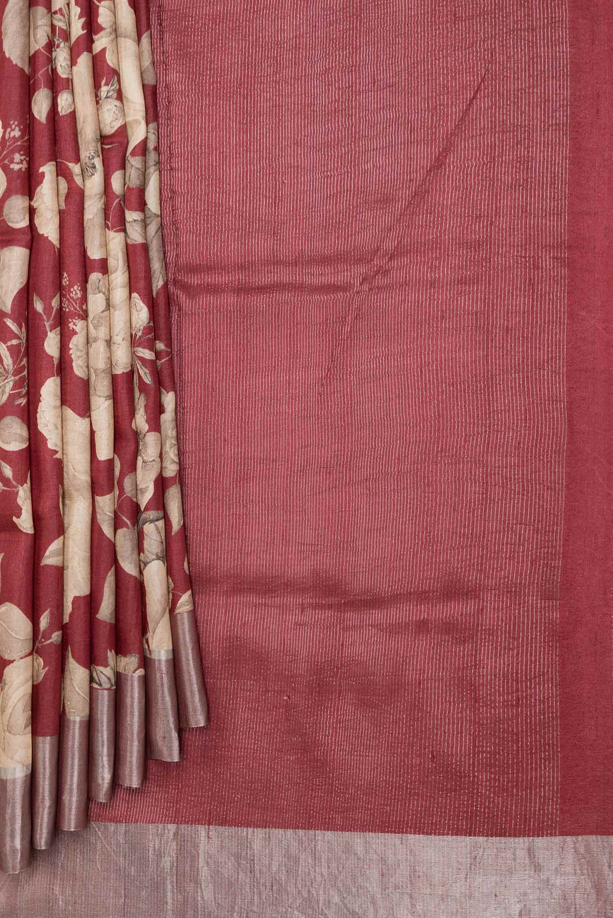Pleats and pallu of Maroon Dual Tone Tussar Silk SareePrinted design on the body and Zari Border