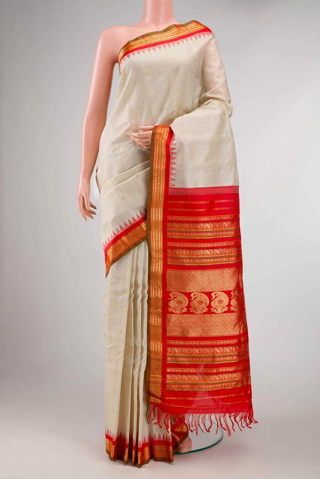 Off White Dual Tone Gadwal Silk Saree with Zari Butta on the body and Zari Border displayed on a mannequin