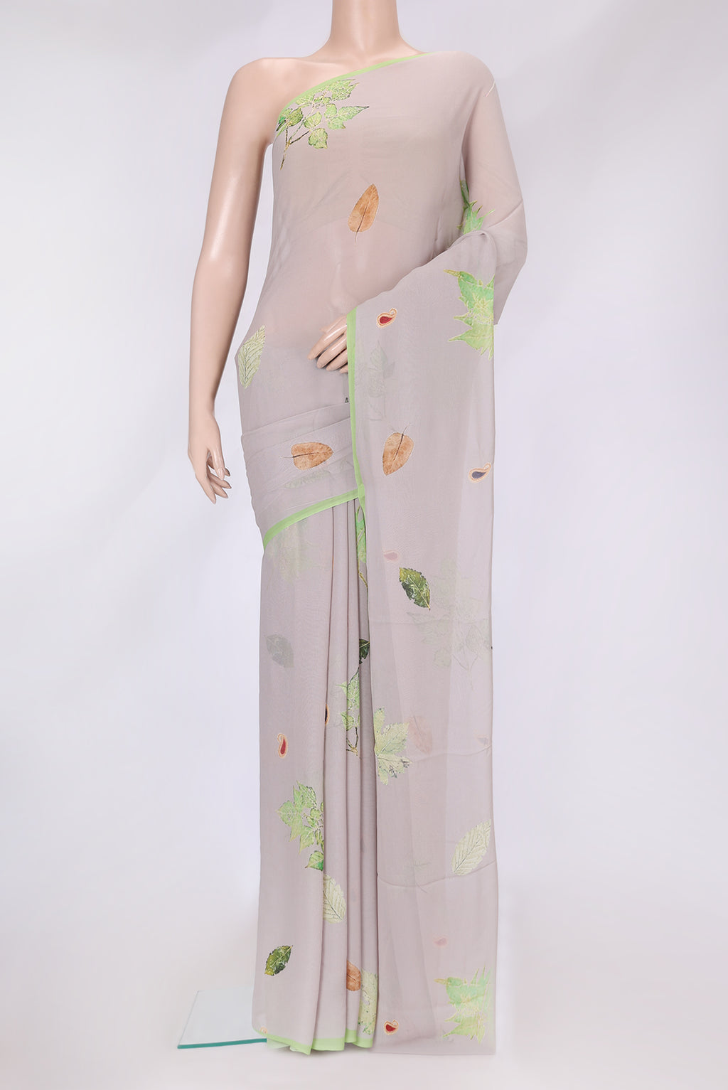Grey Dual Tone Mysore Georgette Saree with Printed design on the body and Without Border.  displayed on a mannequin