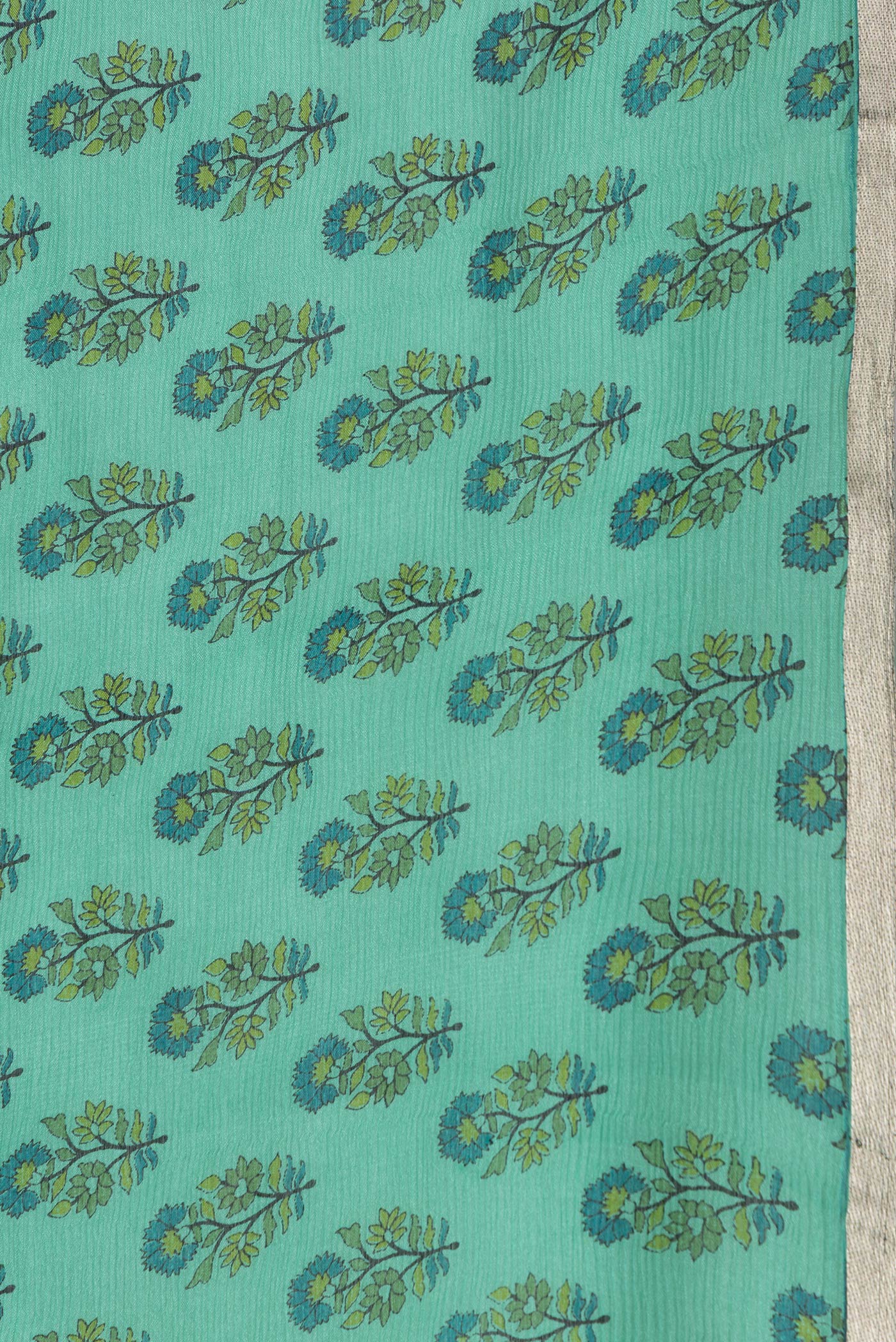 Border image of Sea Green Dual Tone Mysore Chiffon Saree with Printed design on the body and Thin Zari Line. 