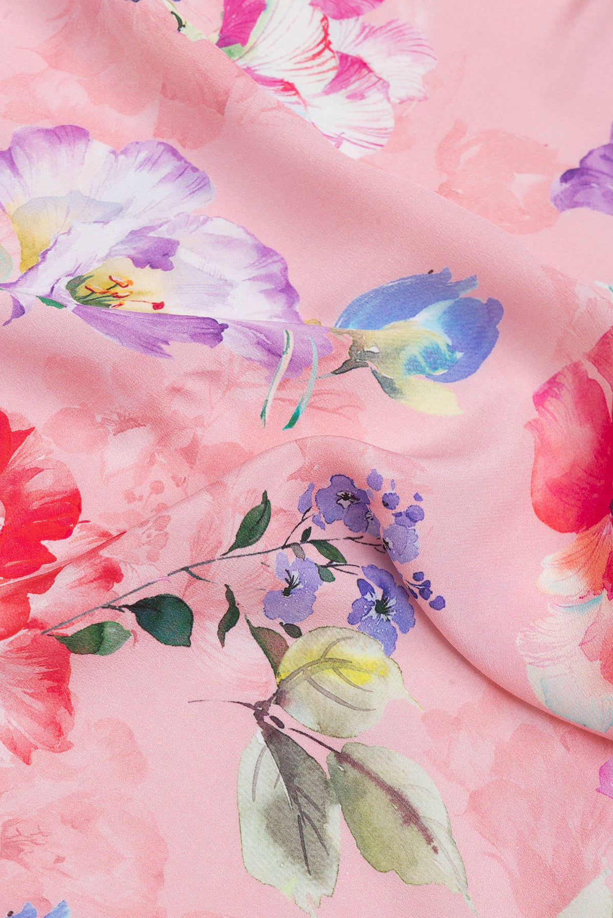 Close up of Rose pink Crepe Saree with Floral Print on the body and Without Border.  displaying folds