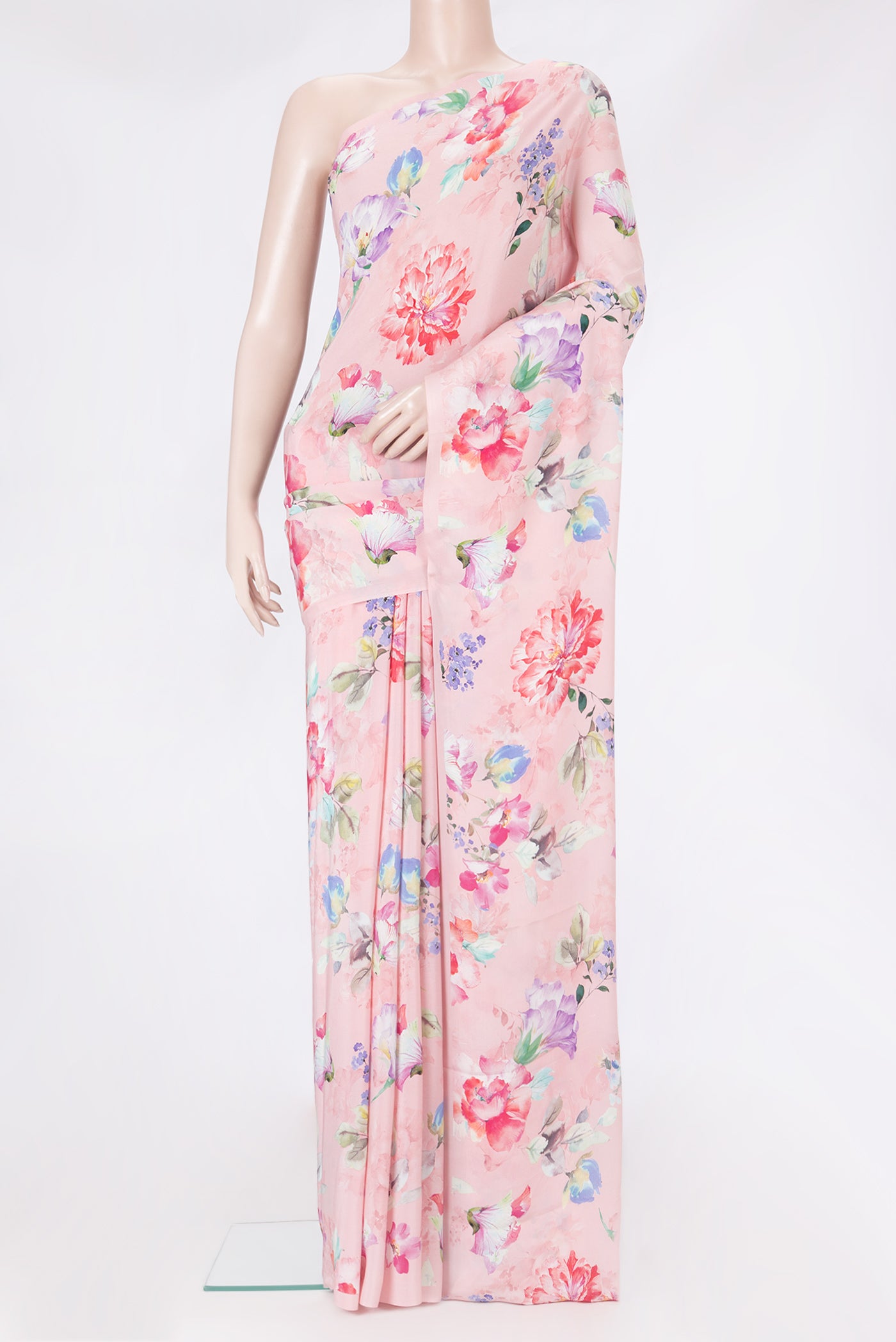 Rose pink Crepe Saree with Floral Print on the body and Without Border.  displayed on a mannequin