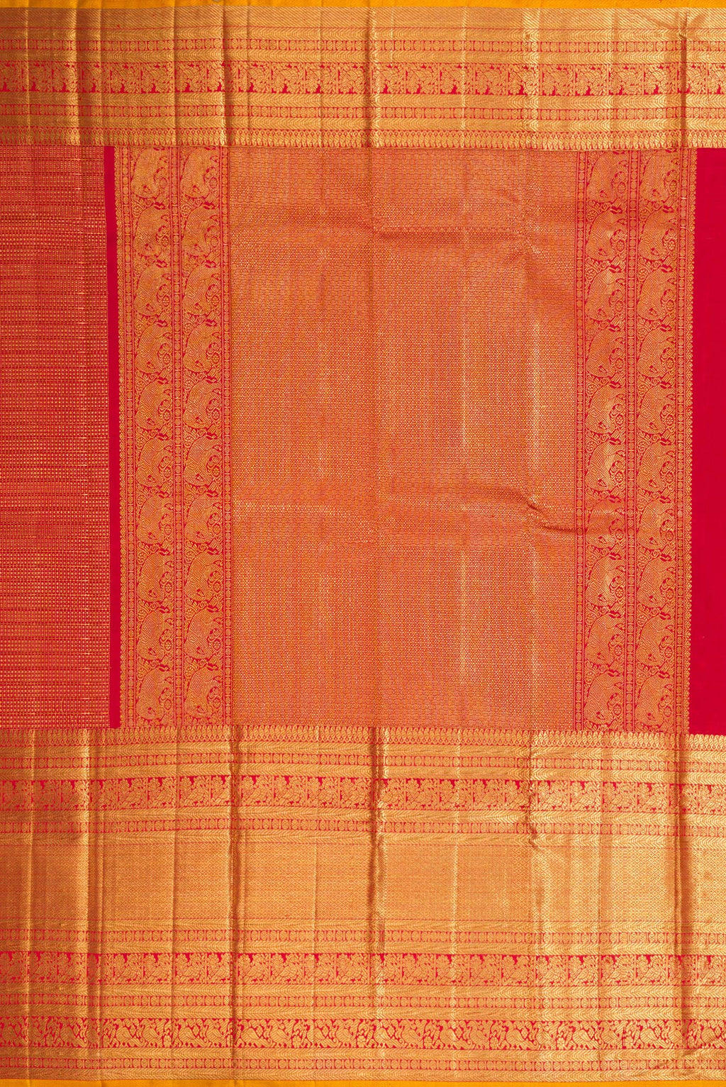 Close up image of the pallu of Maroon Dual Tone Kanchipuram Silk Saree with Zari Brocade on the body and Zari Border. 