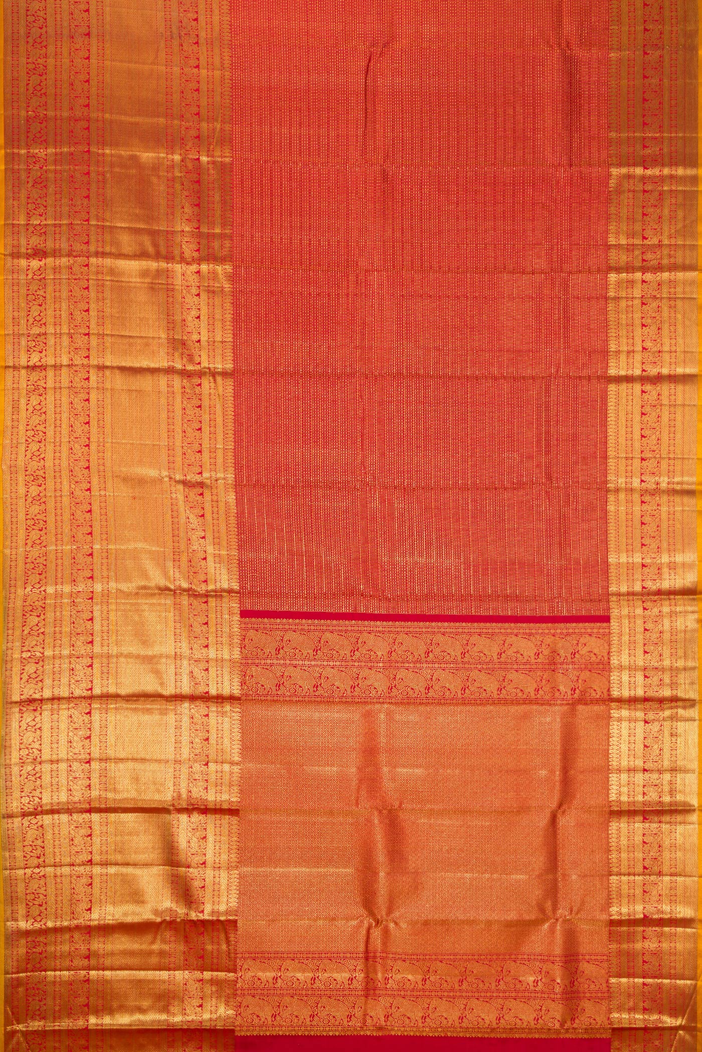 Flat view of Maroon Dual Tone Kanchipuram Silk Saree with Zari Brocade on the body and Zari Border. 