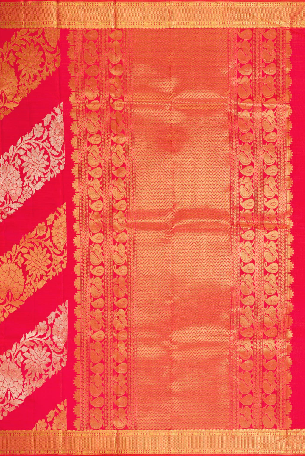 Close up image of the pallu of Coral Dual Tone Kanchipuram Silk Saree with Zari Brocade on the body and Zari Border. 