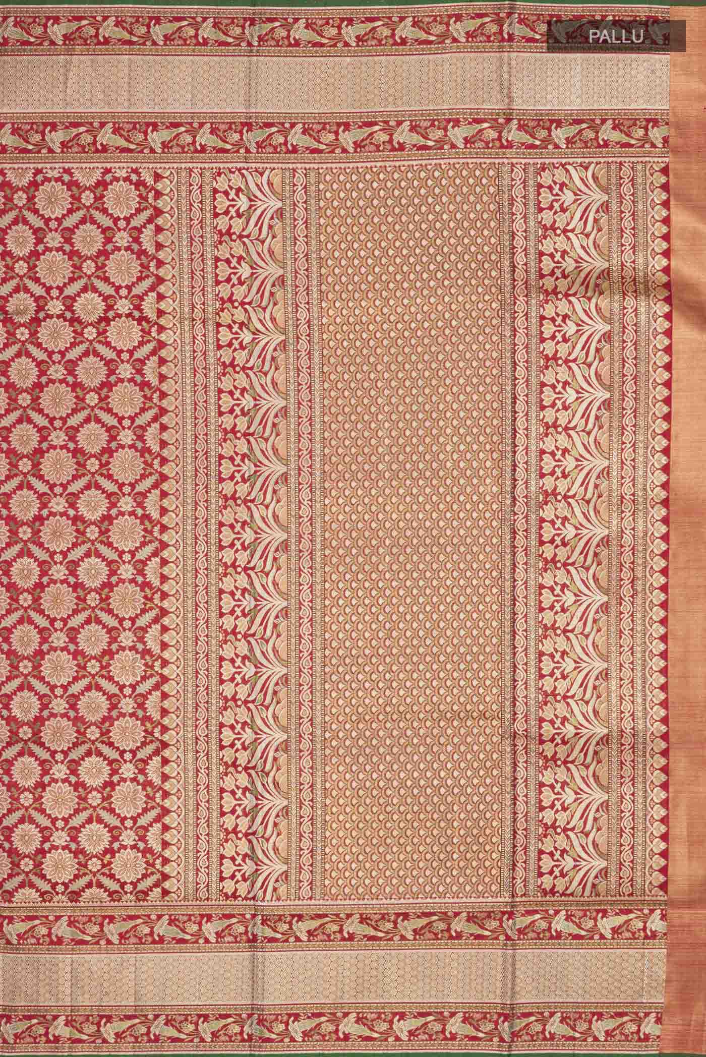 Close up image of the pallu of Red Kanchipuram Silk Saree with Zari Brocade on the body and Zari Border
