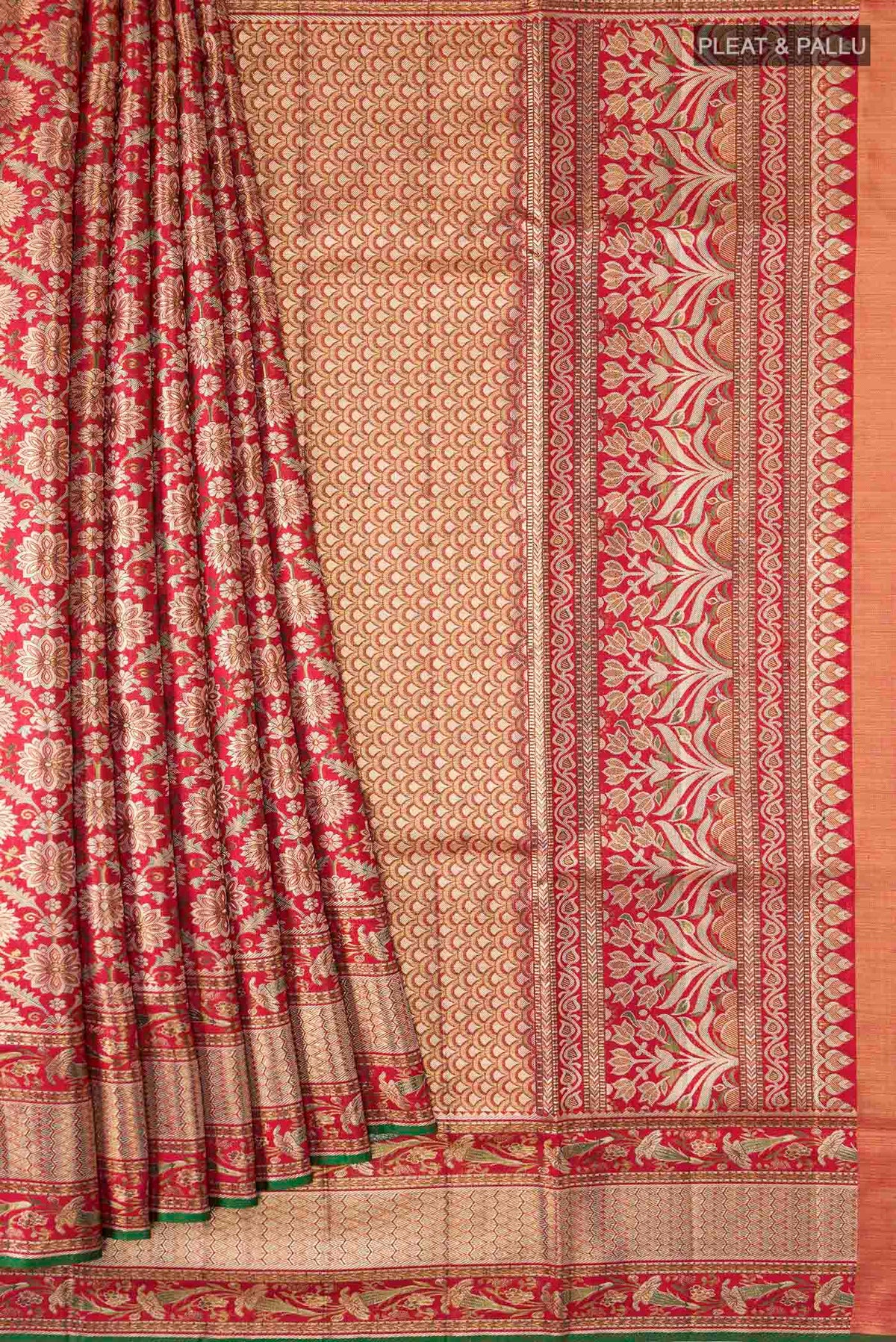 Pleats and pallu of Red Kanchipuram Silk Saree with Zari Brocade on the body and Zari Border