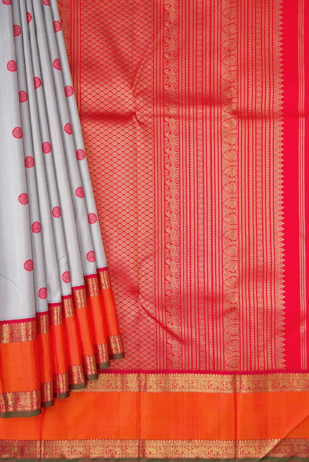 Pleats and pallu of Pure Silk Pure Zari Grey Dual Tone Kanchipuram Saree with Thread Butta on the body and Zari Border. 