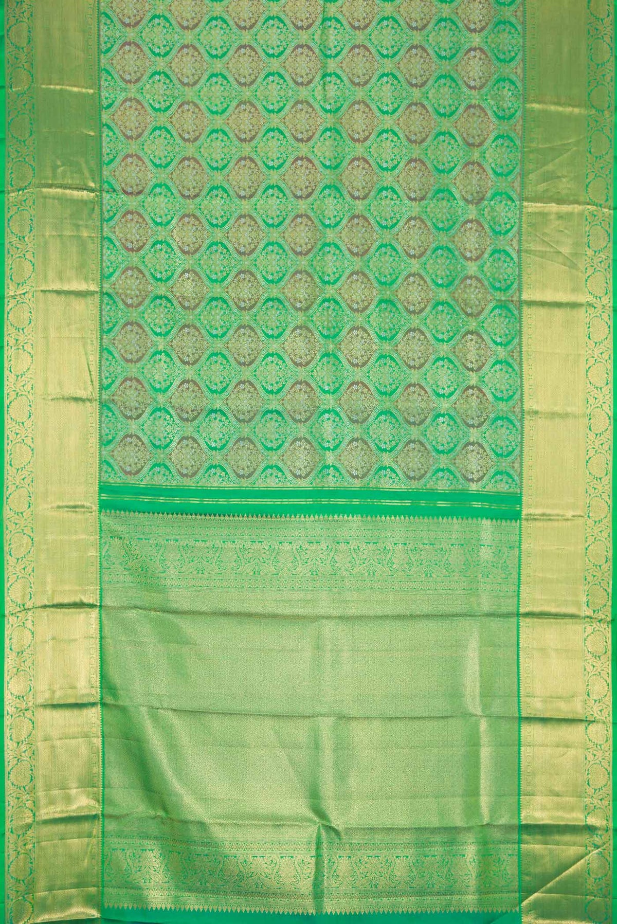 Flat view of Green Dual Tone Kanchipuram Saree with Zari Brocade on the body and Zari Border