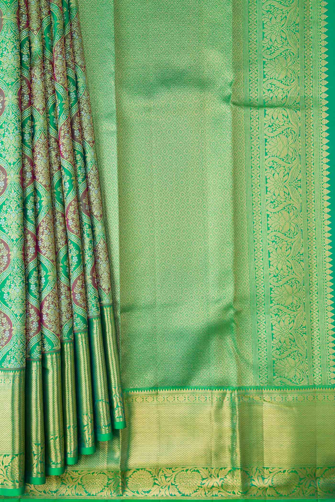 Pleats and pallu of Green Dual Tone Kanchipuram Saree with Zari Brocade on the body and Zari Border