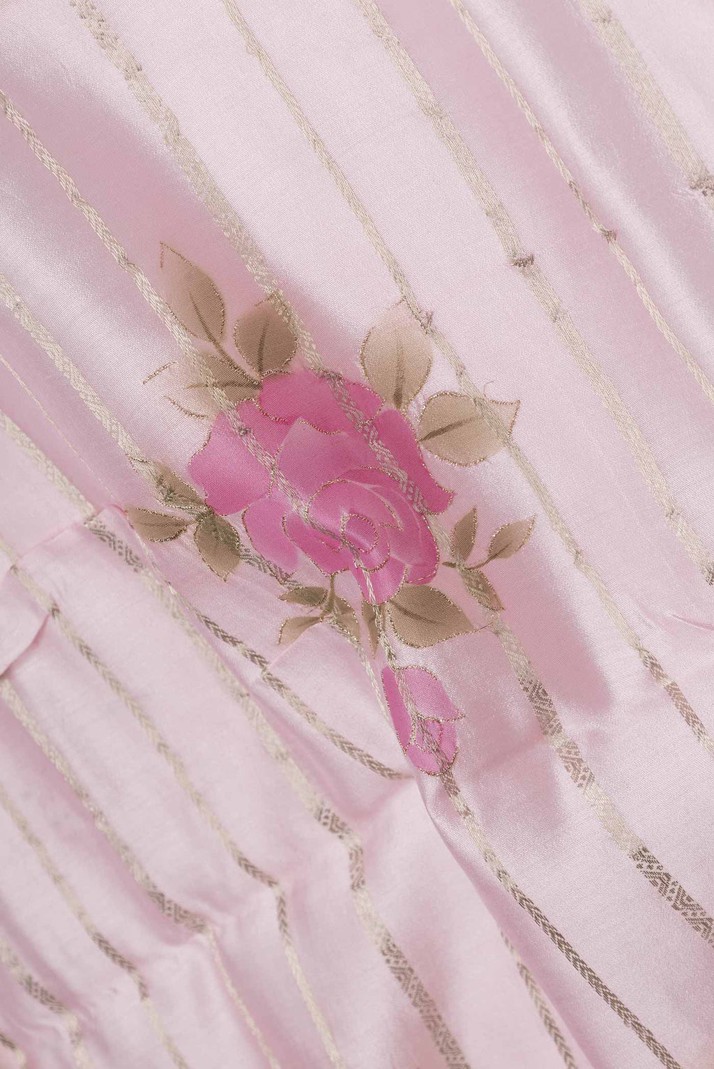 Close up of Rose pink Tussar Silk Saree with Stripes on the body and Thin Zari Line displaying folds