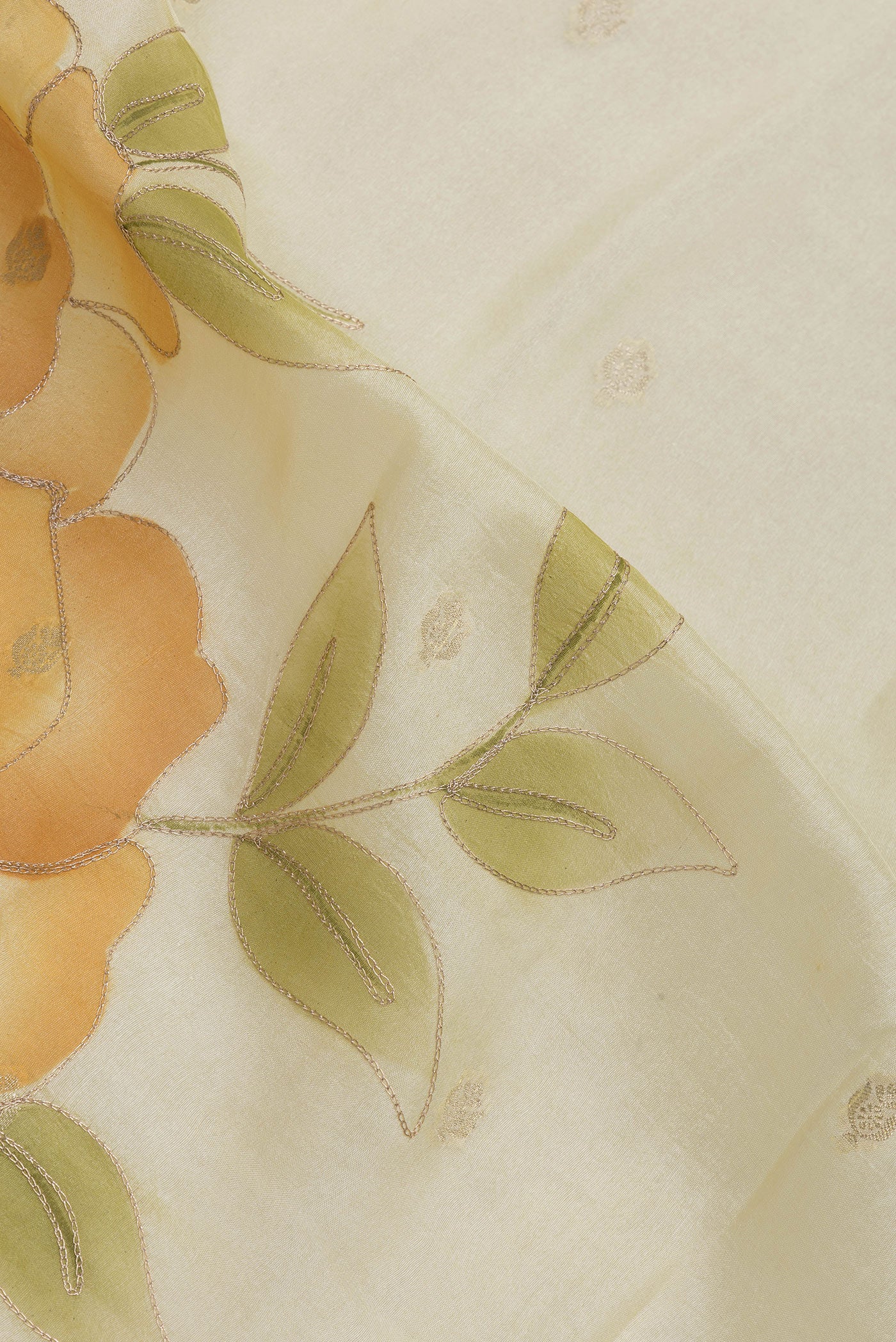 Close up of Sandal Dual Tone Tussar Silk Saree with Zari Butta on the body and Embroidery Border.  displaying folds