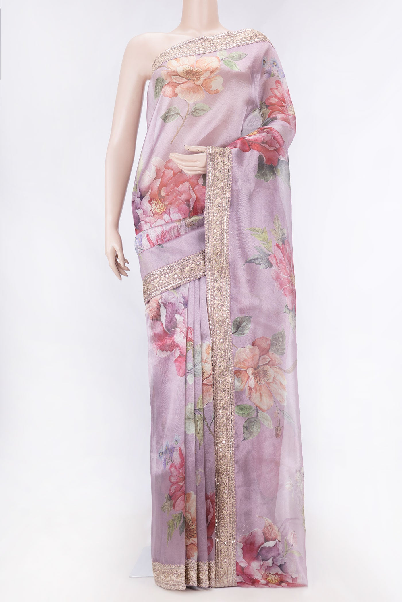 Lavender Dual Tone Tissue Silk SareePrinted design on the body and Embroidery Border displayed on a mannequin