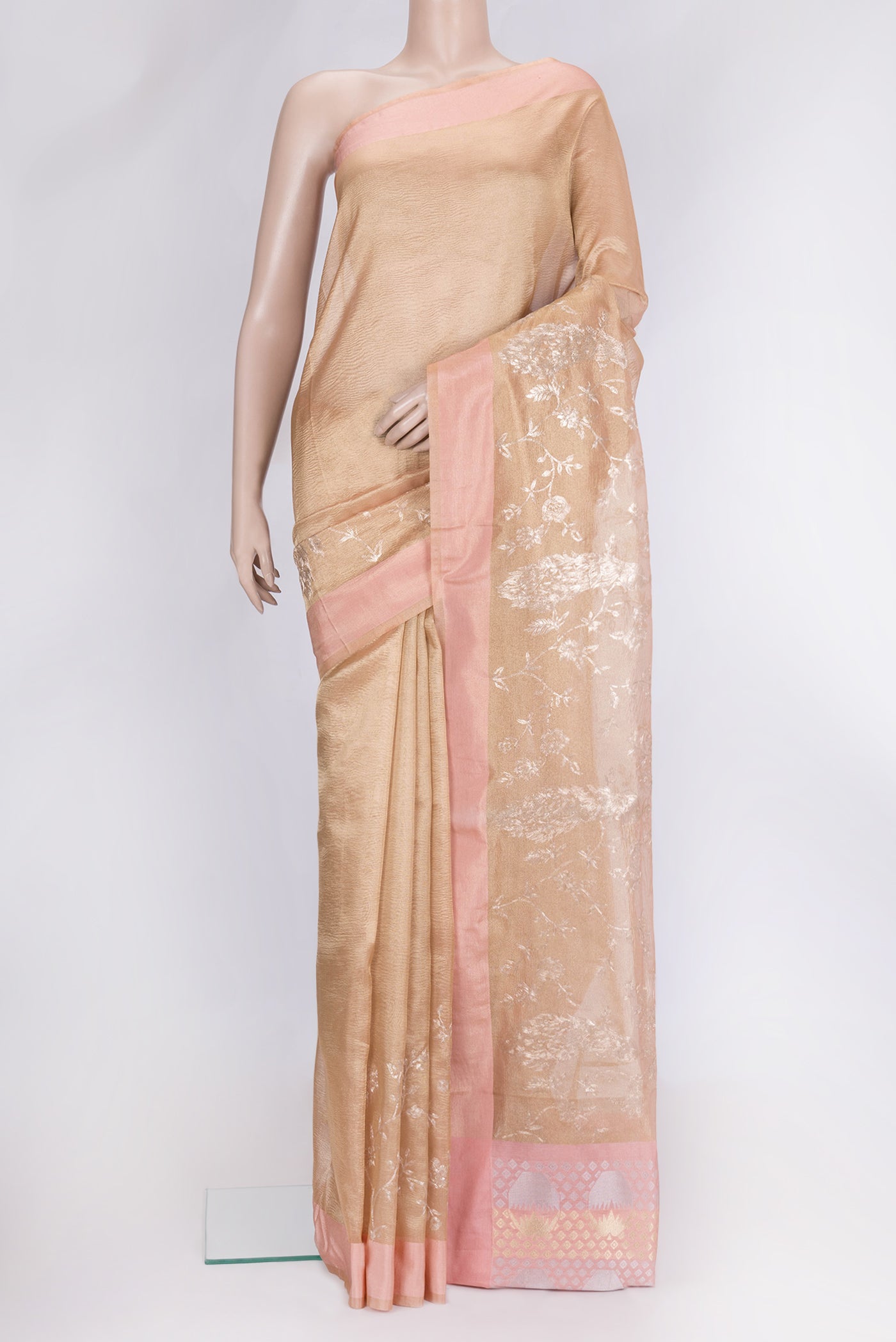 Rose Gold Dual Tone Organza Silk Saree with Zari Brocade on the body and Plain Border.  displayed on a mannequin