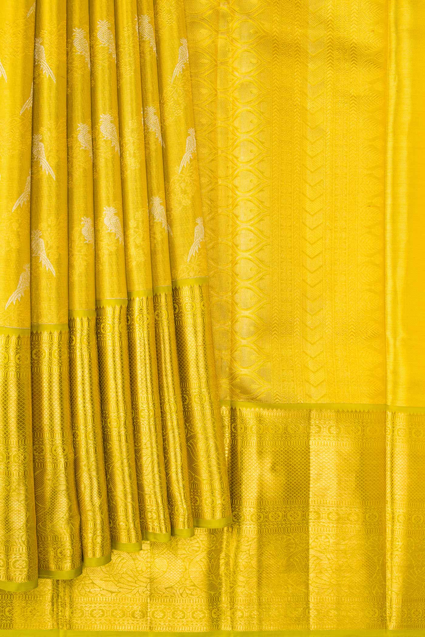 Pleats and pallu of Green Dual Tone Kanchipuram Tissue Silk Saree with Zari Brocade on the body and Zari Border. 