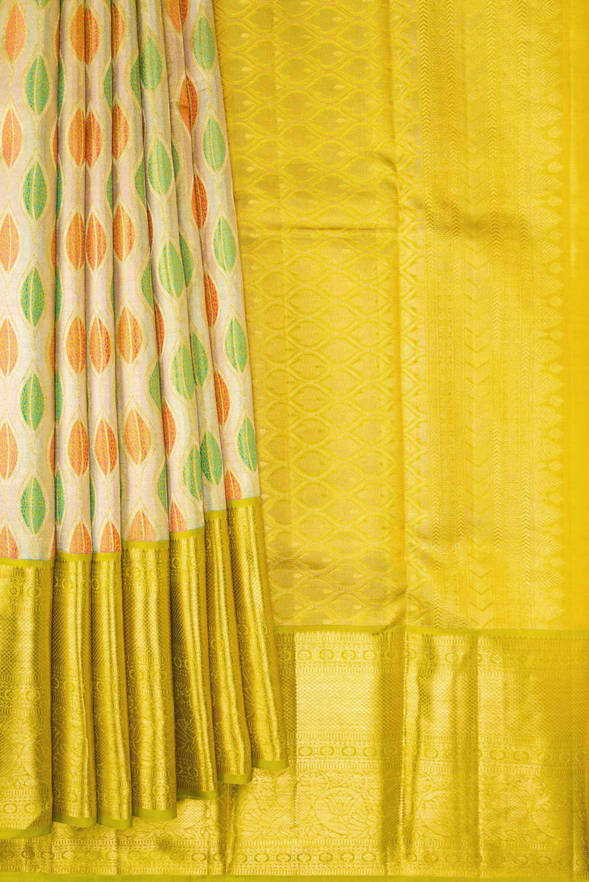Pleats and pallu of Gold Dual Tone Kanchipuram Tissue Silk Saree with Zari Brocade on the body and Zari Border. 