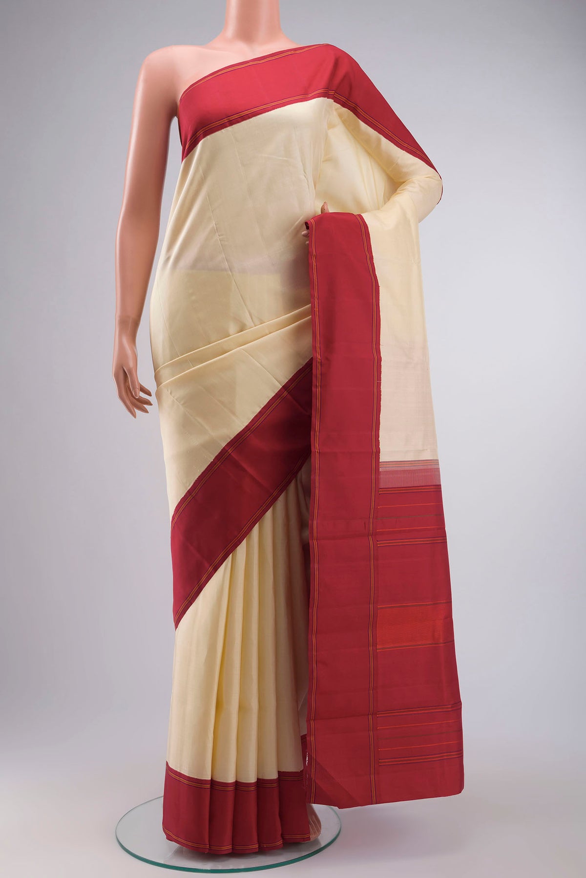 Sandal Kanchipuram Silk Saree with Plain Body and Plain Border displayed on a mannequin
