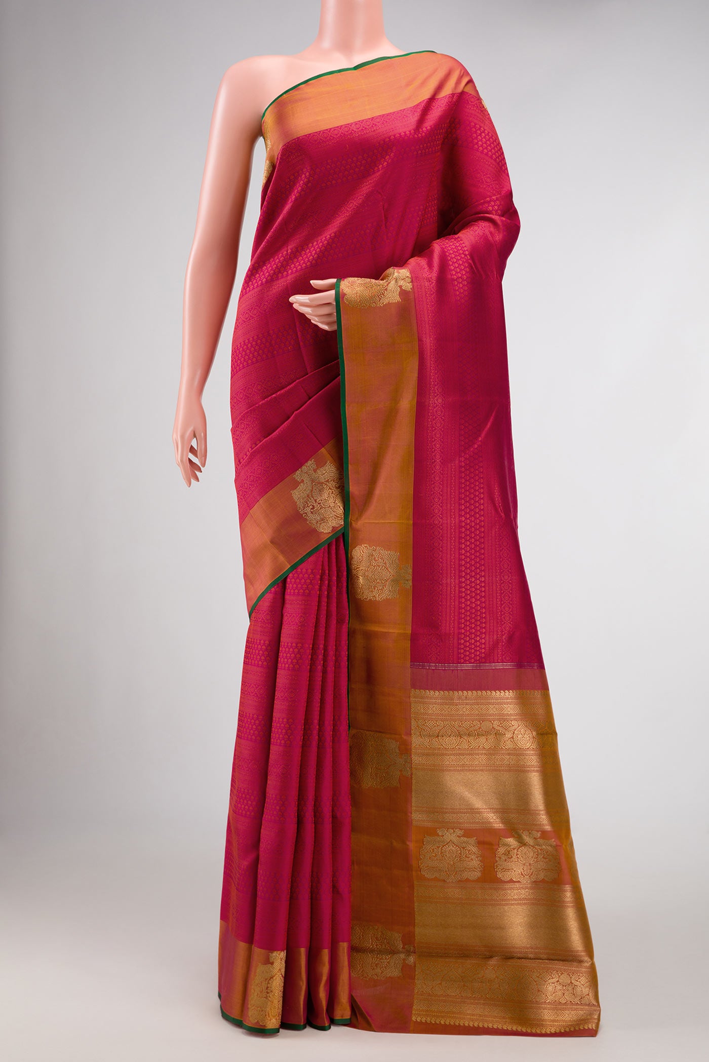 Pure Silk Pure Zari Maroon Dual Tone Kanchipuram Saree with Jacquard design on the body and Zari Border.  displayed on a mannequin