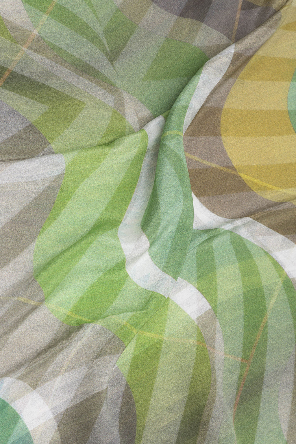 Close up of Multi Color Crepe Saree with Printed design on the body and Plain Border.  displaying folds
