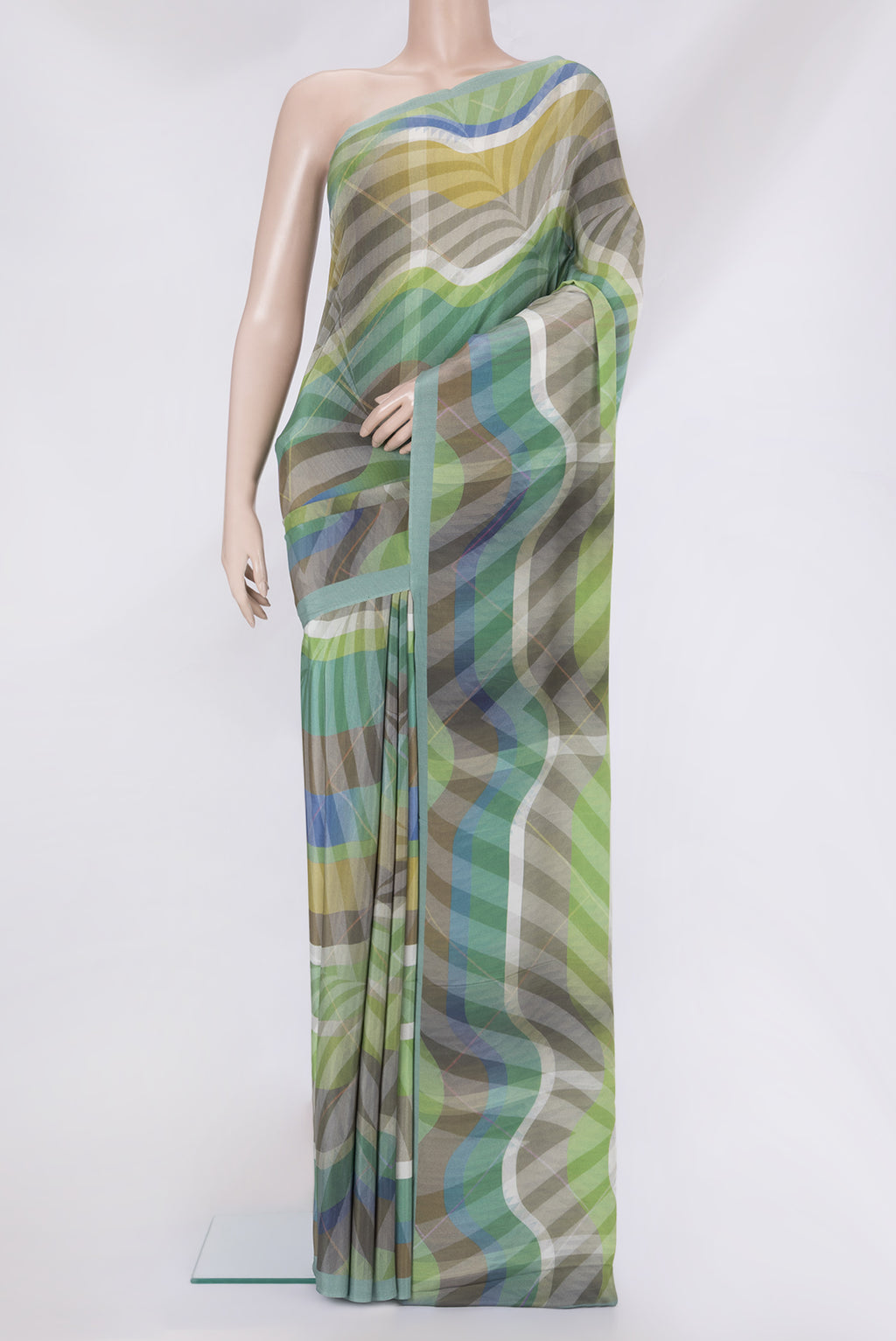 Multi Color Crepe Saree with Printed design on the body and Plain Border.  displayed on a mannequin