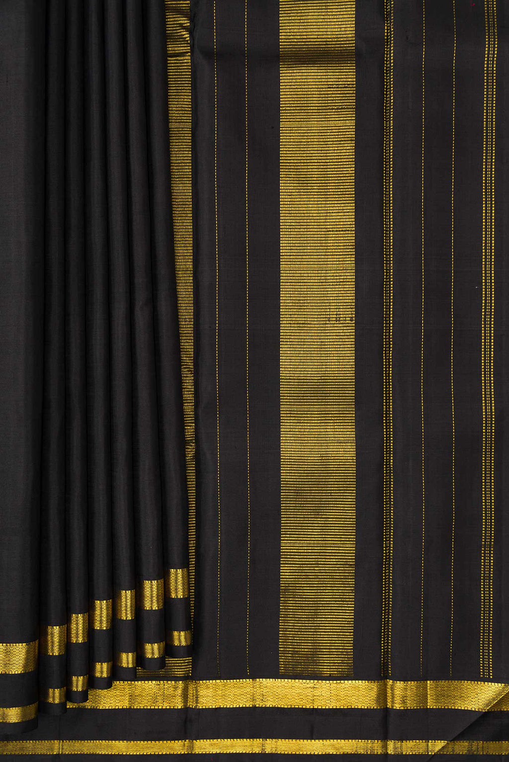 Pleats and pallu of Black Dual Tone Kanjivaram Silk Saree with Plain Body and Zari Border. 