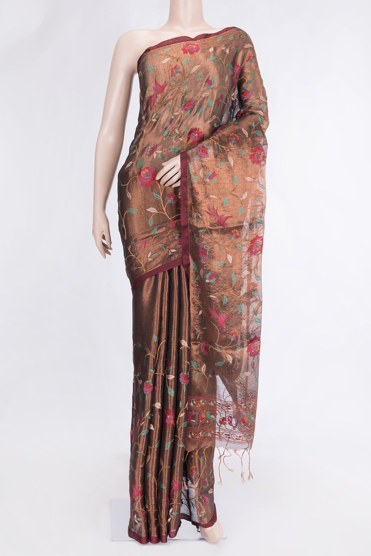 Maroon Dual Tone Organza Silk Saree with Embroidery on the body and Zari Border.  displayed on a mannequin