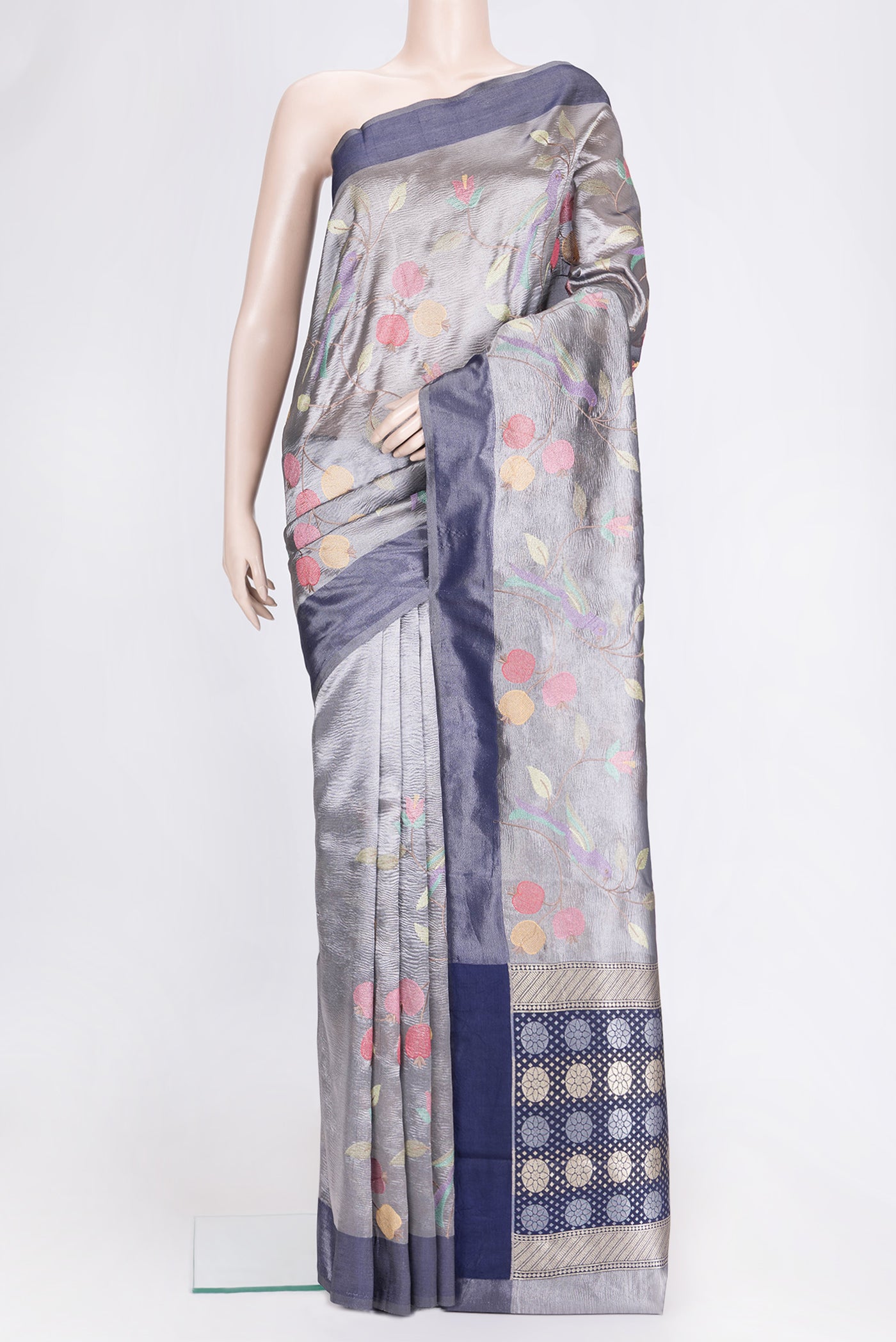Grey Dual Tone Organza Silk Saree with Embroidery on the body and Plain Border.  displayed on a mannequin