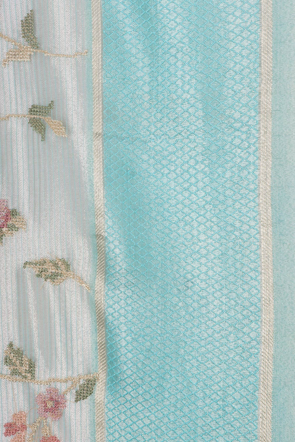 Border image of Sea Green Dual Tone Organza Silk Saree with Embroidery on the body and Zari And Thread Border. 