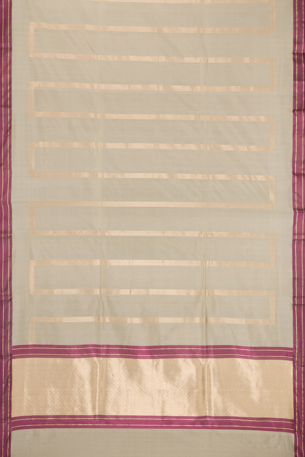 Flat view of Beige Banarasi Silk Saree with Stripes on the body and Zari Border. 