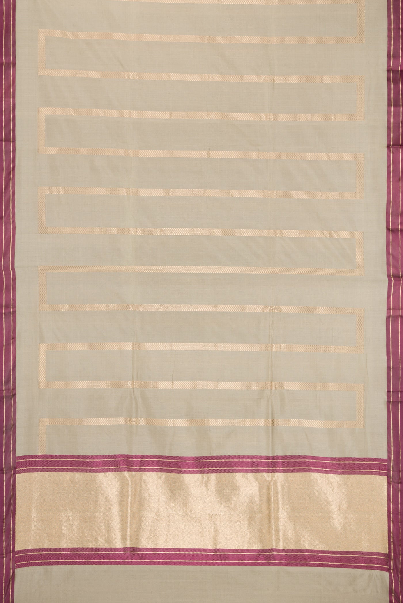 Flat view of Beige Banarasi Silk Saree with Stripes on the body and Zari Border. 