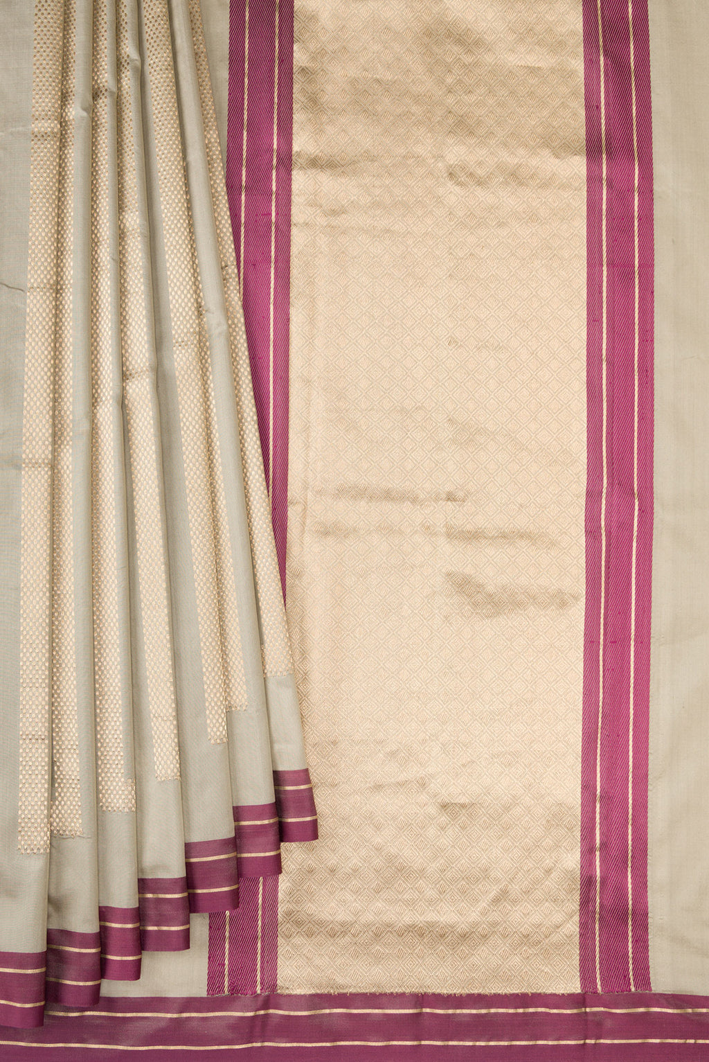 Pleats and pallu of Beige Banarasi Silk Saree with Stripes on the body and Zari Border. 