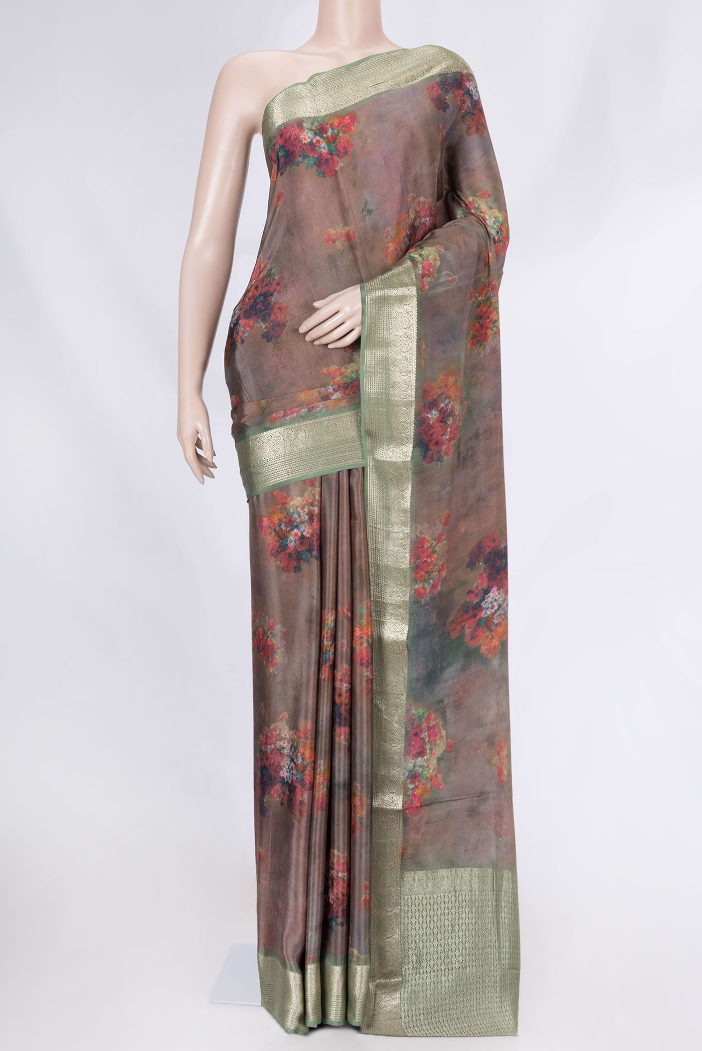 Brown Mysore Crepe Saree with Floral Print on the body and Zari Border displayed on a mannequin