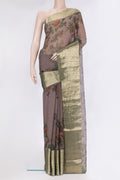 Brown Chiffon Saree with Printed design on the body and Zari Border.  displayed on a mannequin