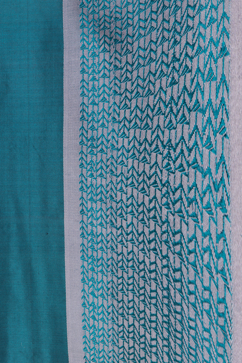 Border image of Peacock Blue Dual Tone Banarasi Silk Saree with Zari Butta on the body and Thread Border. 