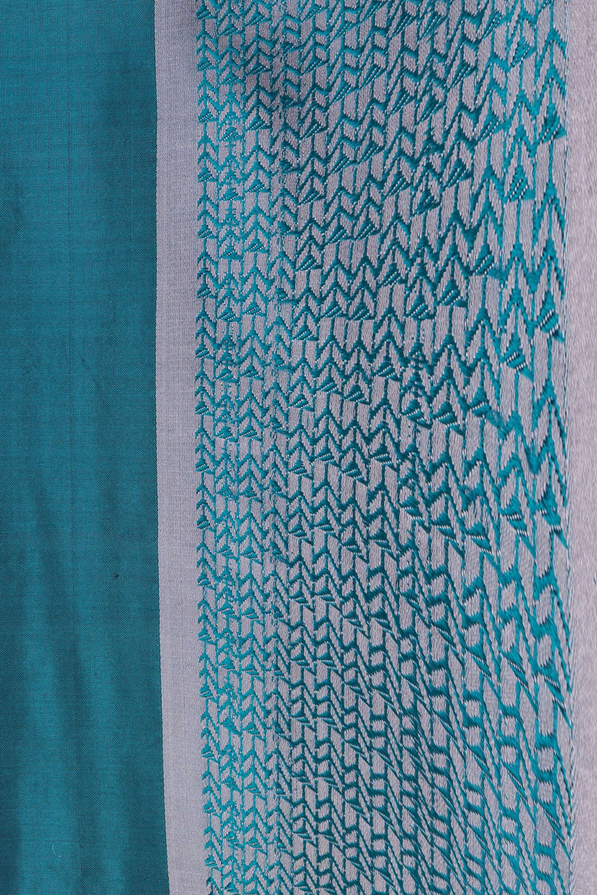 Border image of Peacock Blue Dual Tone Banarasi Silk Saree with Zari Butta on the body and Thread Border. 
