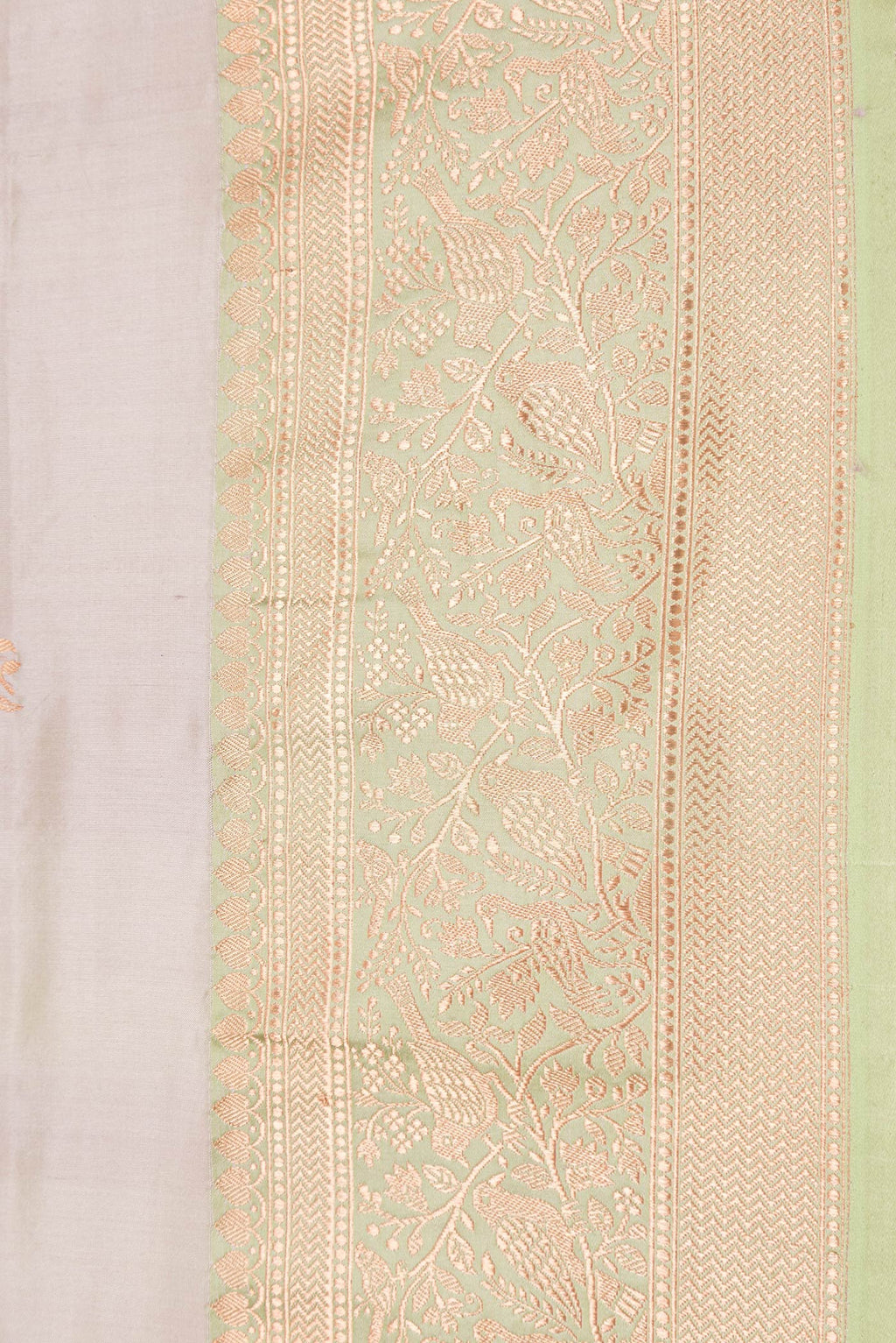 Border image of Beige Dual Tone Banarasi Silk Saree with Zari Butta on the body and Zari Border. 