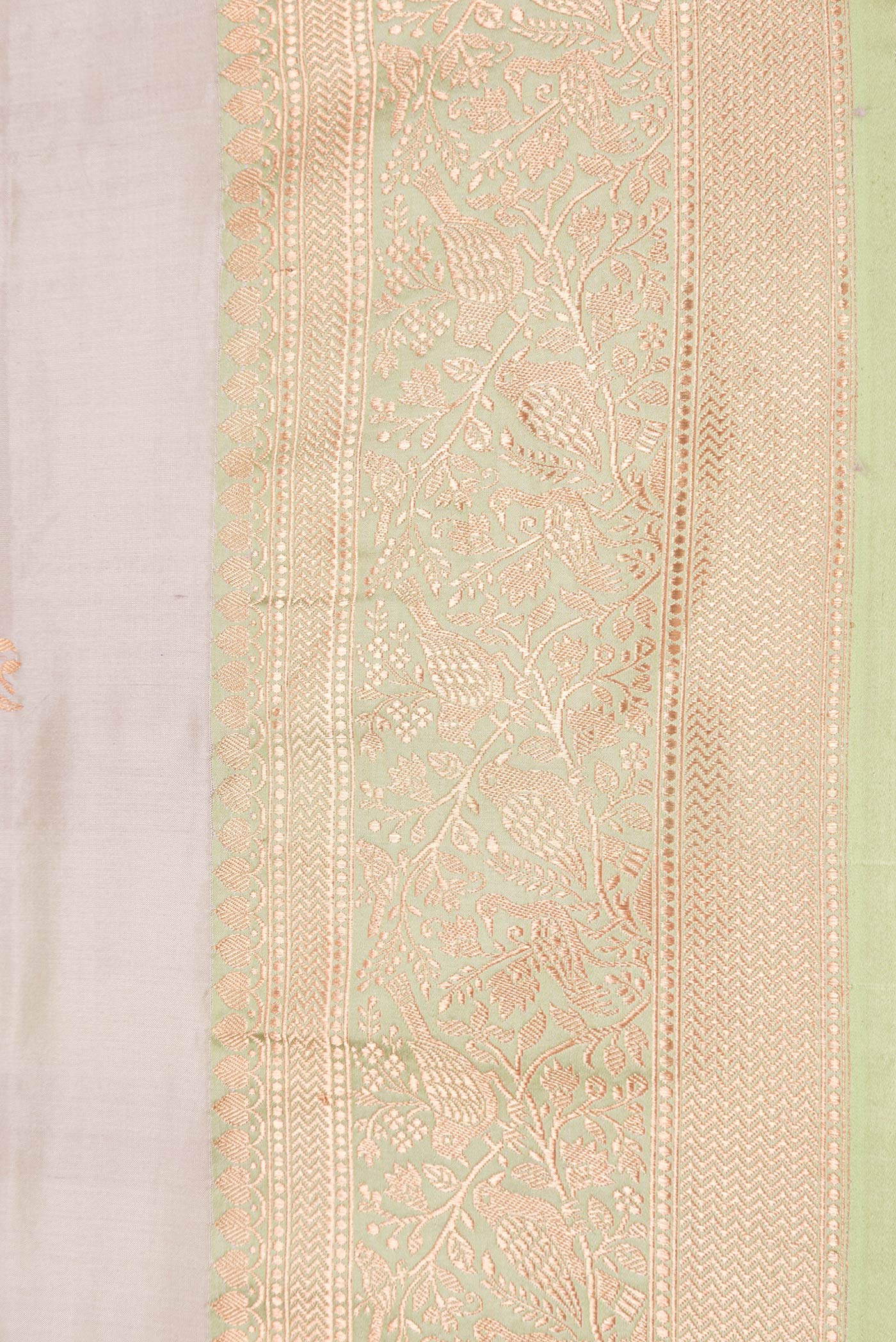 Border image of Beige Dual Tone Banarasi Silk Saree with Zari Butta on the body and Zari Border. 