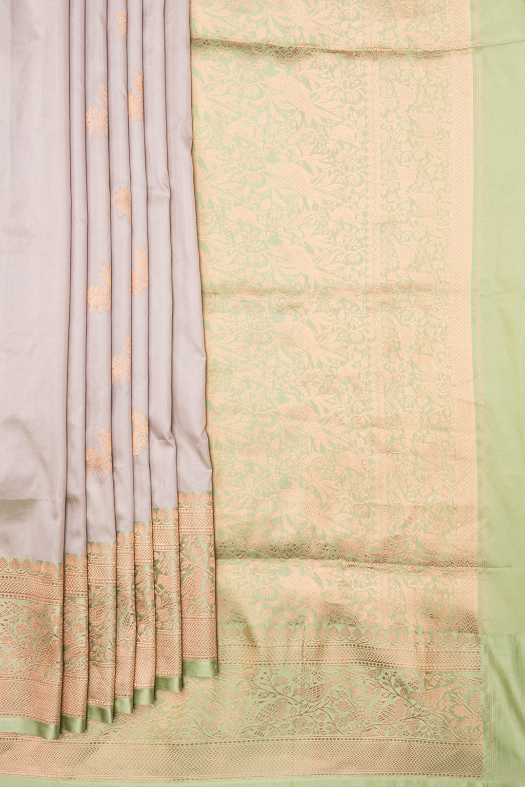 Pleats and pallu of Beige Dual Tone Banarasi Silk Saree with Zari Butta on the body and Zari Border. 