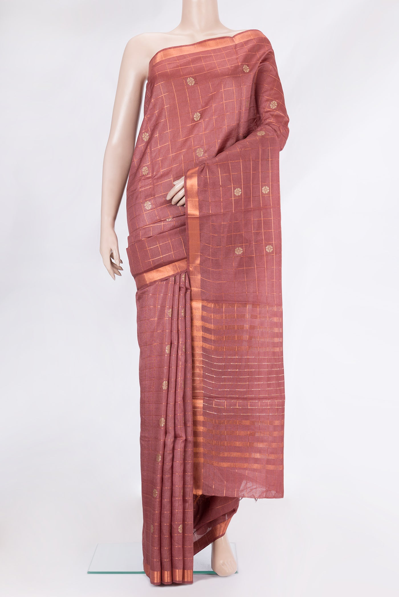 Maroon Tussar Silk Saree with Checked design on the body and Zari Border.  displayed on a mannequin