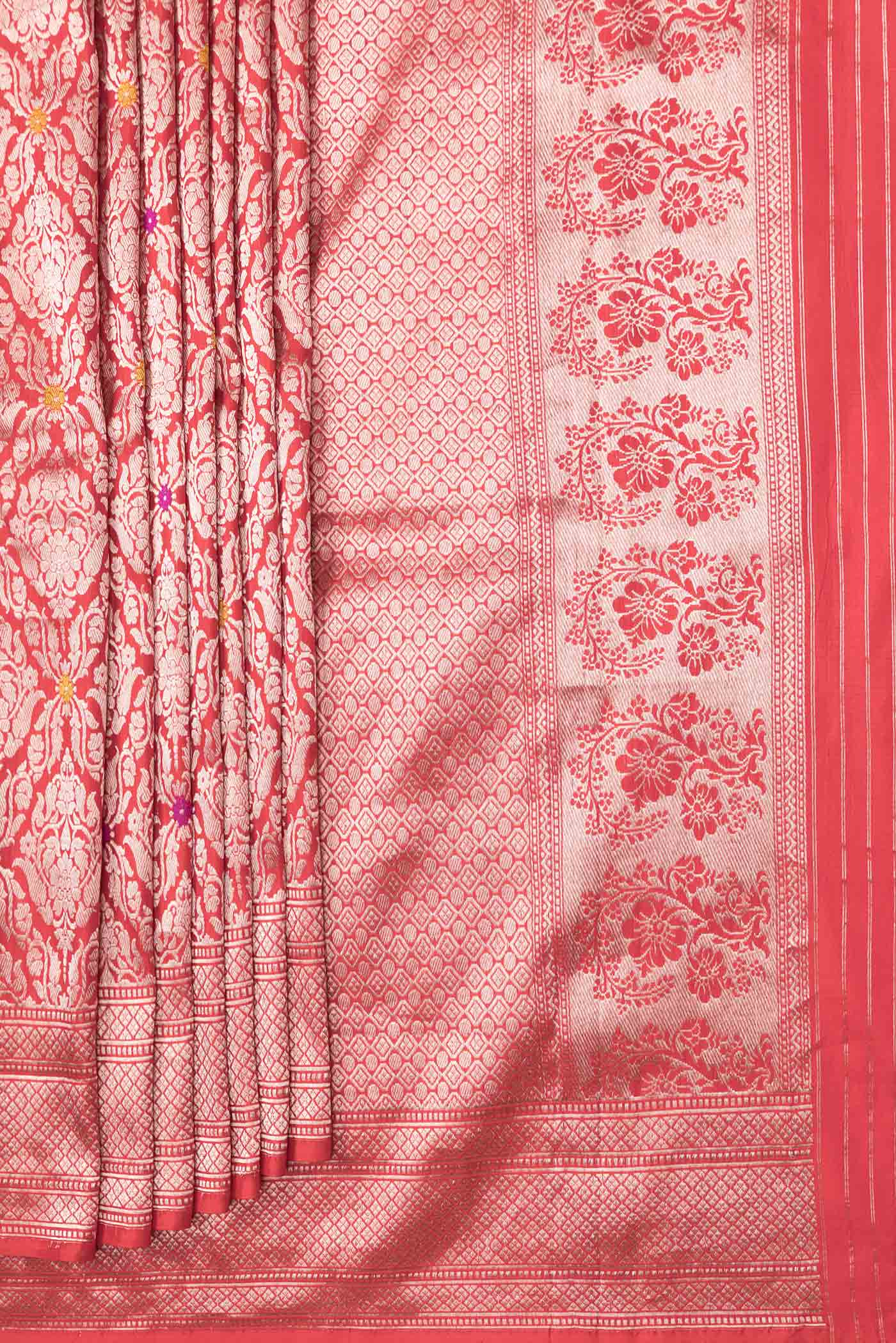 Pleats and pallu of Red Dual Tone Banarasi Silk Saree with Zari Brocade on the body and Zari Border. 