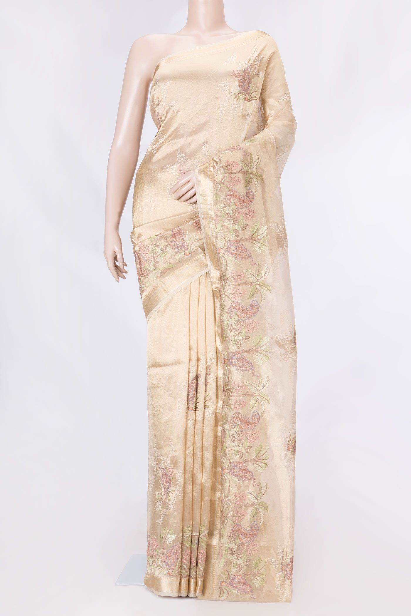 Gold Dual Tone Organza Silk Saree with Embroidery on the body and Embroidery Border displayed on a mannequin