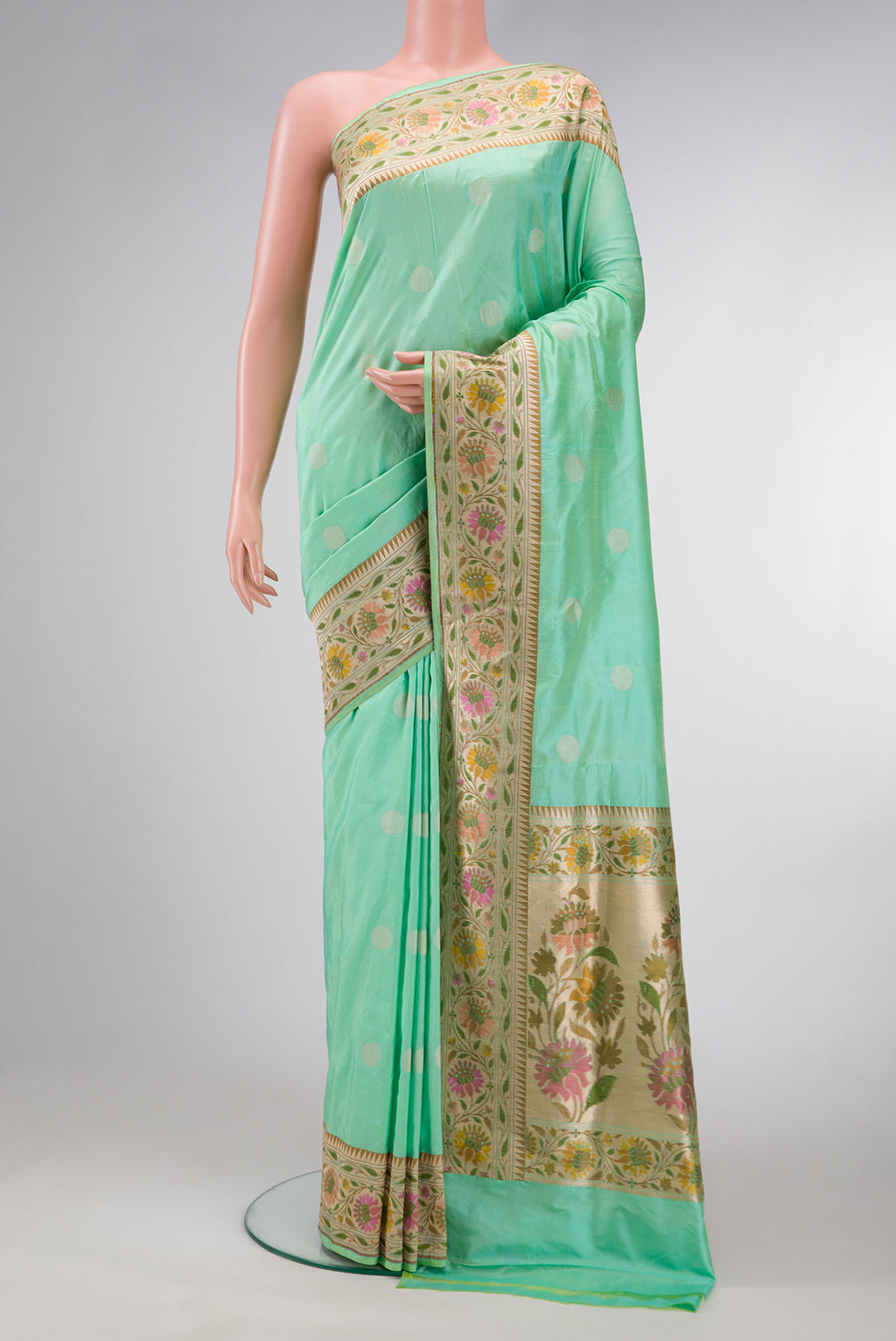 Sea Green Dual Tone Banarasi Silk Saree with Zari Butta on the body and Zari Border.  displayed on a mannequin