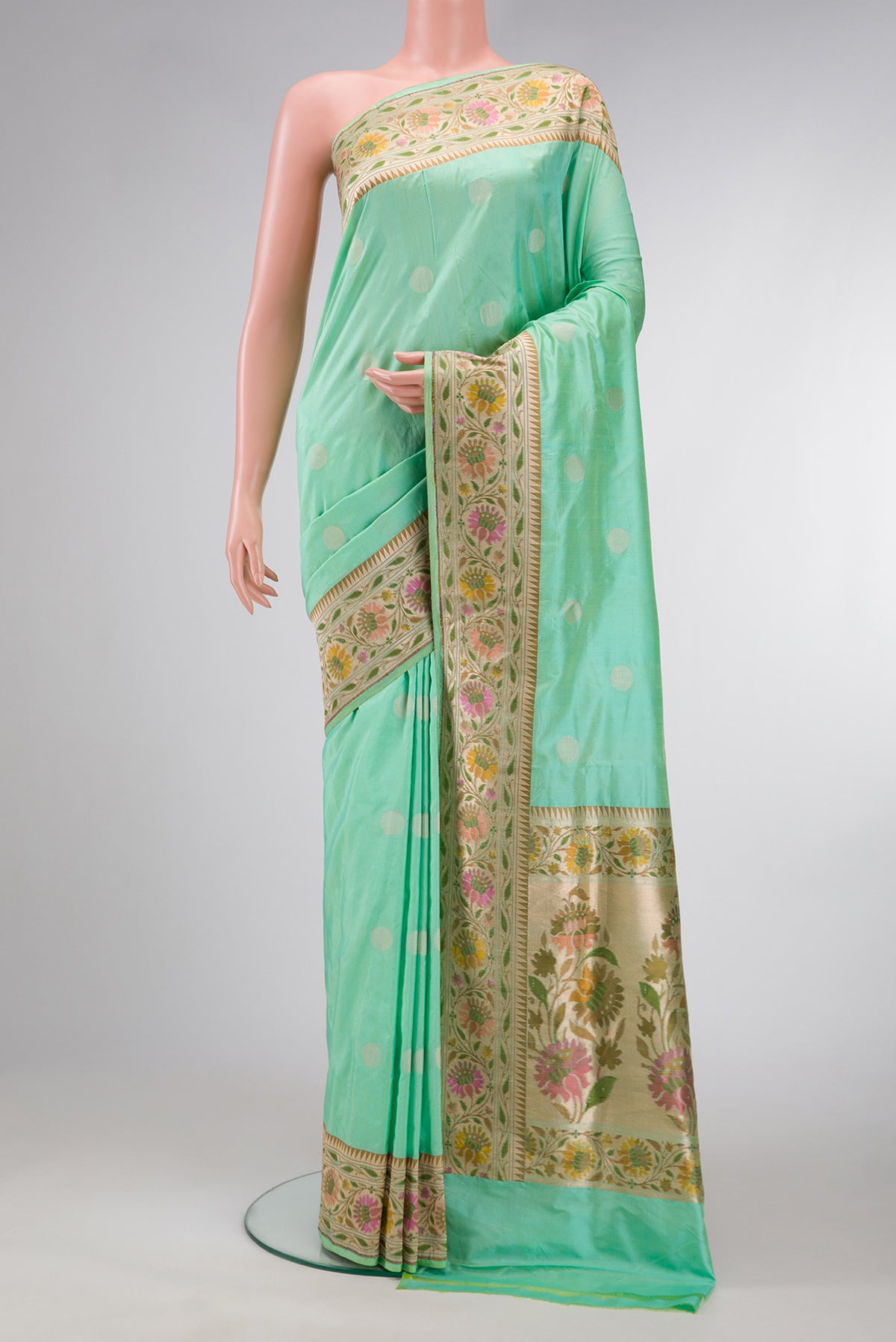 Sea Green Dual Tone Banarasi Silk Saree with Zari Butta on the body and Zari Border.  displayed on a mannequin