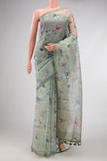 Green Dual Tone Organza Silk Saree with Printed design on the body and Printed Border.  displayed on a mannequin